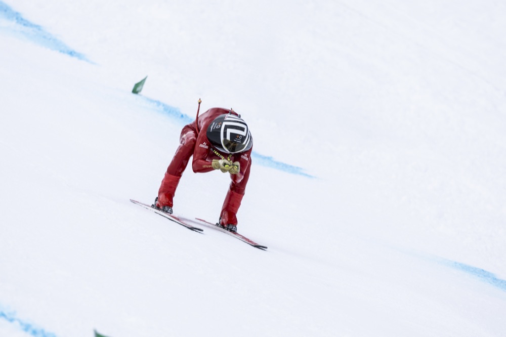 Jan Farrell head-on in a full tuck at speed on the Vars track
